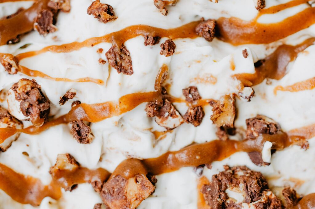ice cream with caramel drizzle and cookie chunks